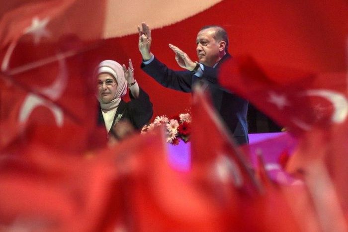 Turkish President Recep Tayyip Erdogan and his wife Emine Erdogan campaign at a rally on April 12, 2017