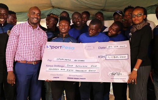 AllStars squad with Sportpesa officials during the rewarding ceremony