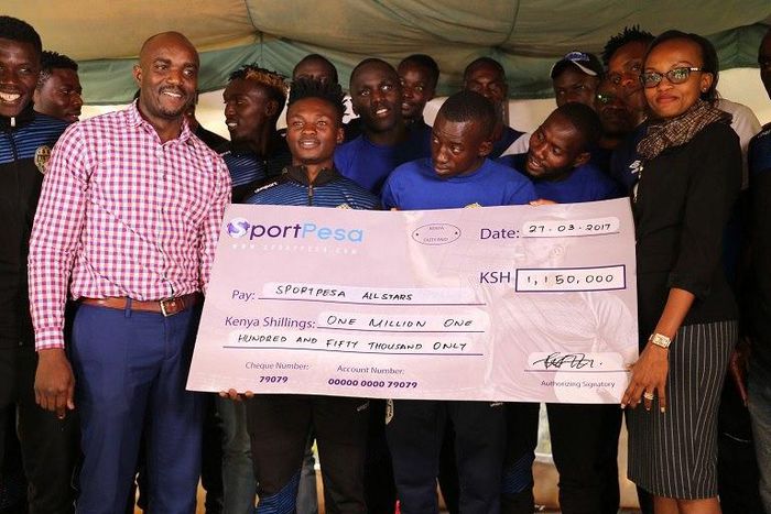 AllStars squad with Sportpesa officials during the rewarding ceremony