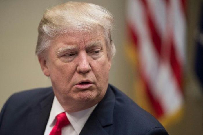 US President Donald Trump speaks in the Roosevelt Room at the White House on January 30, 2017