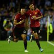 Manchester United's forward Marcus Rashford (R) celebrates with his teammate Antonio Valencia after scoring against Celta Vigo on May 4, 2017