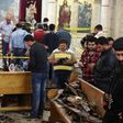 Forensics collecting evidence at the site of a bomb blast which struck worshippers gathering to celebrate Palm Sunday at the Mar Girgis Coptic Church in the Nile Delta City of Tanta, 120 kilometres north of Cairo, on April 9, 2017
