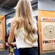 Woman Narrowly Dodges An Axe Flying At Her Head