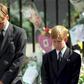 Prince William (left) and Prince Harry bow their heads during the funeral of their mother Diana, Princess of Wales, at Westminster Abbey in 1997