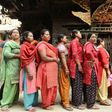 Voters queue to cast their ballots at a polling station in Thimi, on the outskirts of Kathmandu, on May 14, 2017