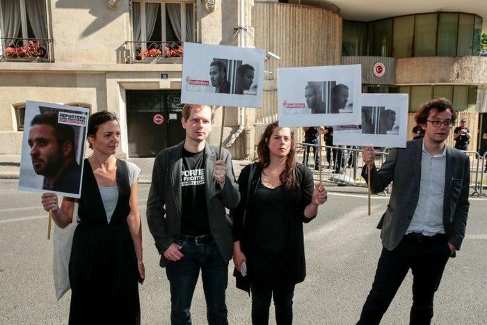 People take part in a protest calling for the release of Mathias Depardon, a French journalist held in Turkey, in front of the Embassy of Turkey in Paris on May 25, 2017