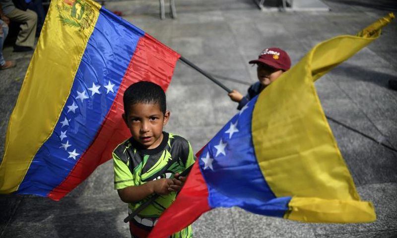 The first step before the IMF can provide financial aid to crisis-devastated Venezuela is for the international community to decide whether to recognize President Nicolas Maduro or opposition leader Juan Guaido