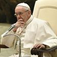 Pope Francis looks on during a general audience at the Paul VI Audience Hall at the Vatican on February 8, 2017