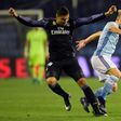 Real Madrid's Casemiro (L) fights for the ball with Celta Vigo's Daniel Wass during their Spanish Copa del Rey (King's Cup) quarter-final second leg match, in Vigo, on January 25, 2017