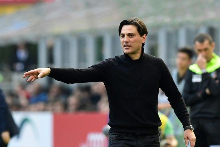 AC Milan's coach Vincenzo Montella follows the action during their Italian Serie A match against Palermo, at the San Siro stadium in Milan, on April 9, 2017