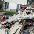 Rescuers search after a building collapsed burying several people in Swiebodzice, Poland on April 8, 2017