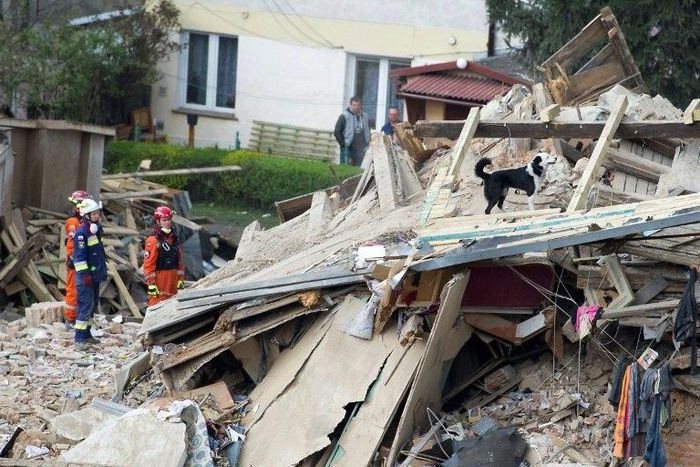 Rescuers search after a building collapsed burying several people in Swiebodzice, Poland on April 8, 2017