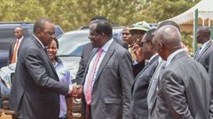 President Uhuru shakes hands with CoG Chair Wycliffe Oparanya when he arrived for the 2019 Devolution Conference in Kirinyaga County