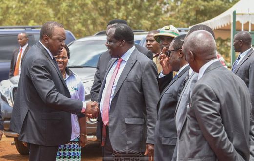 President Uhuru shakes hands with CoG Chair Wycliffe Oparanya when he arrived for the 2019 Devolution Conference in Kirinyaga County