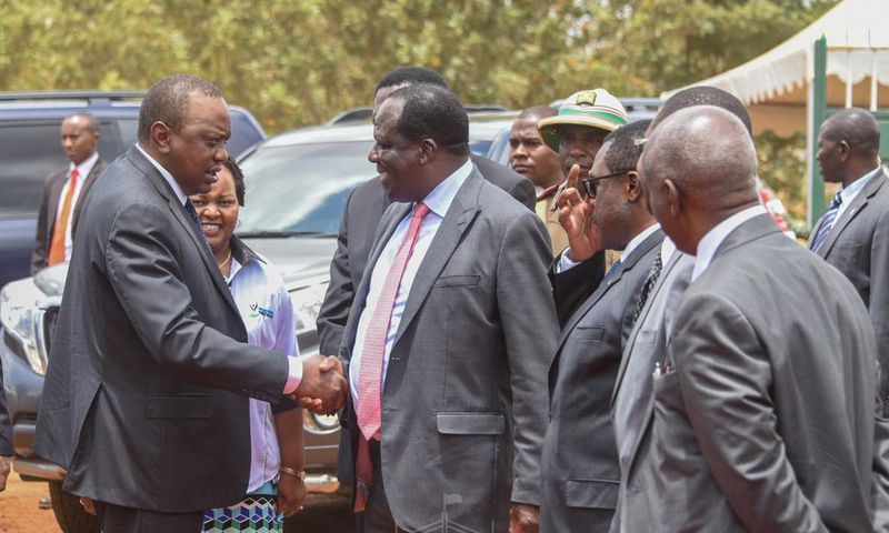 President Uhuru shakes hands with CoG Chair Wycliffe Oparanya when he arrived for the 2019 Devolution Conference in Kirinyaga County