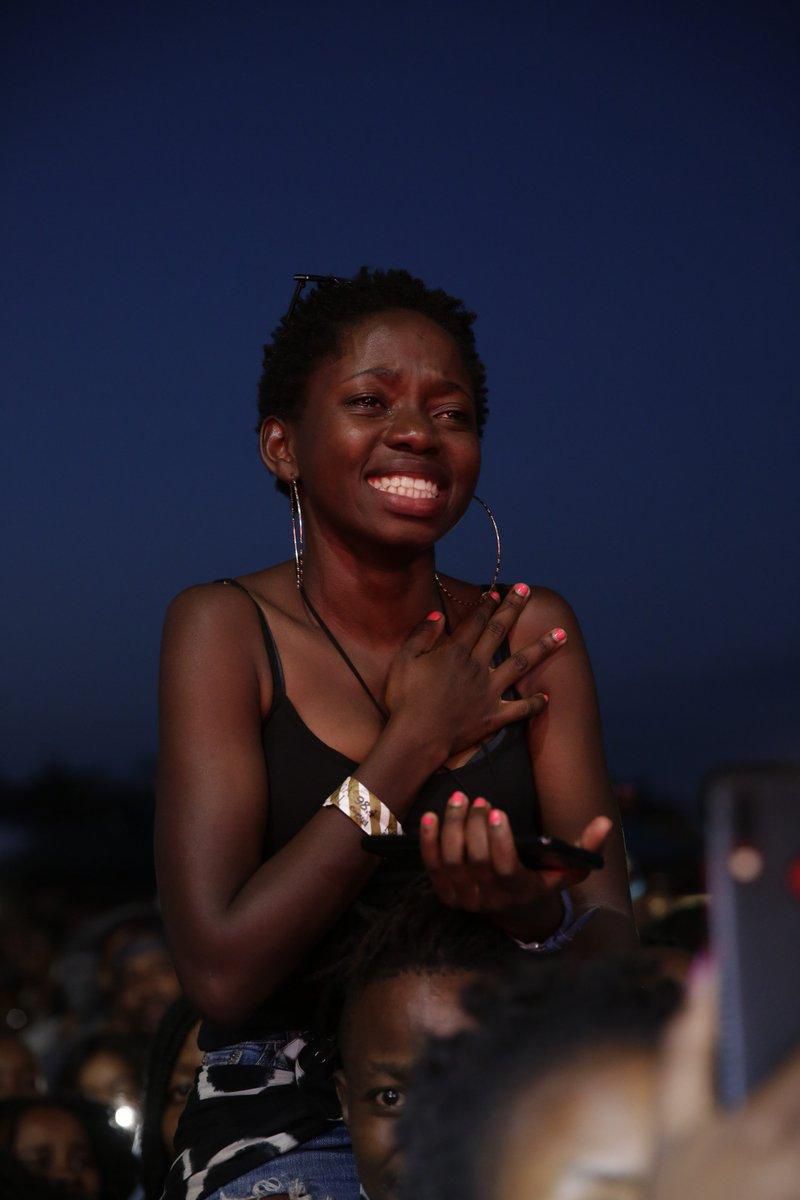 A reveler getting emotional while Asa performs (Image by Capital FM Kenya)