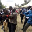 ODM politician Moses Nandalwe aka 'Mr Money Bags' forces his way into the funeral