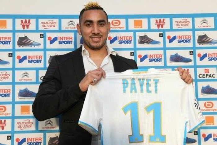 Dimitri Payet poses with his Marseille jersey during a press conference at the Robert-Louis Dreyfus Stadium in southern France, on January 30, 2017