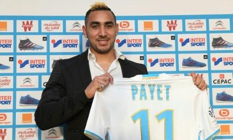 Dimitri Payet poses with his Marseille jersey during a press conference at the Robert-Louis Dreyfus Stadium in southern France, on January 30, 2017