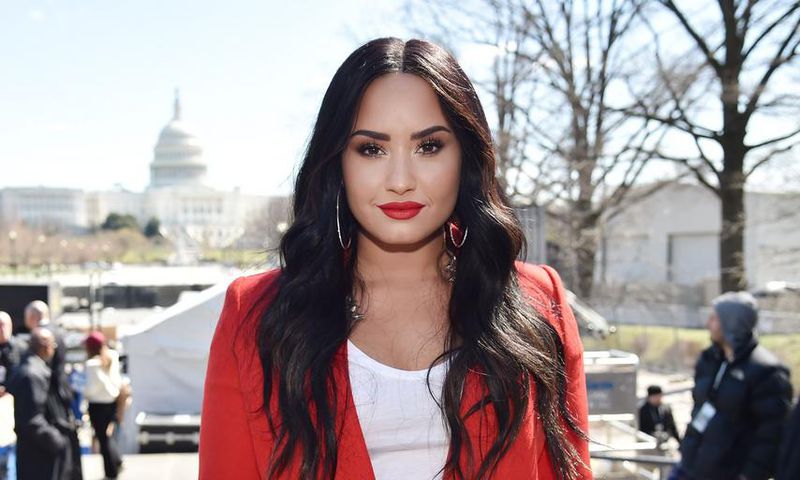 Demi Lovato Knocks Out Her Trainer's Tooth