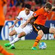 Brisbane Roar's Thomas Kristensen (right) battles for the ball with Shuto Yamamoto of the Kashima Antlers during their AFC Champions League clash in Brisbane on April 12, 2017