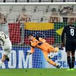 Juventus' forward Paulo Dybala (L) scores a penalty against Porto's goalkeeper Iker Casillas during their UEFA Champions League match on March 14, 2017 in Turin
