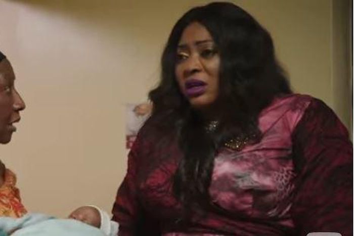 Patience Ozokwor and Ayo Adesanya on the set of "Omugwo"