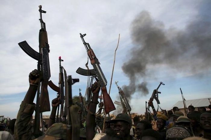 Rebel fighters hold up their rifles in Upper Nile State, South Sudan,  file.   REUTERS/Goran Tomasevic/File Photo