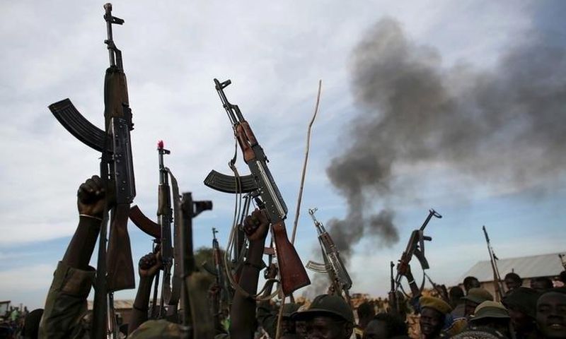 Rebel fighters hold up their rifles in Upper Nile State, South Sudan,  file.   REUTERS/Goran Tomasevic/File Photo