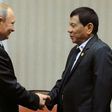 Philippine President Rodrigo Duterte (R) flies to Russia Monday to meet his hero Vladimir Putin, seen together on the sidelines of an APEC summit in Lima in 2016, seek arms and steer his nation's foreign policy course further away from longtime ally th...
