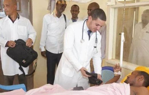 One of the Cuban doctors assigned to Mandera County Dr Landy Rodriguez attends to a patient after performing a past operation