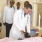 One of the Cuban doctors assigned to Mandera County Dr Landy Rodriguez attends to a patient after performing a past operation