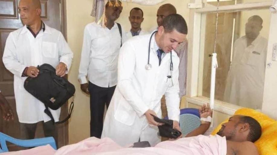 One of the Cuban doctors assigned to Mandera County Dr Landy Rodriguez attends to a patient after performing a past operation
