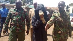 Naftali Njahi Kinuthia escorted by police to his first court appearance following murder of Ivy Wangechi (Twitter)