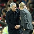 Manchester United's manager Jose Mourinho (L) shakes hands with Manchester City's counterpart Pep Guardiola after their English Football League Cup match, in October 2016