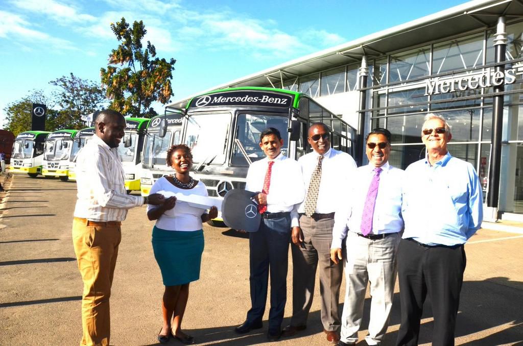 Citi Hoppa official receiving the new buses