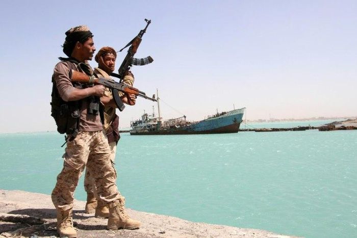Yemeni pro-regime forces patrol the port of Mokha, on February 9, 2017