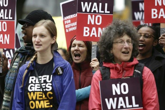 Protesters rallied outside the 9th US Circuit Court of Appeals as it prepared to hear arguments on President Donald Trump's revised travel ban