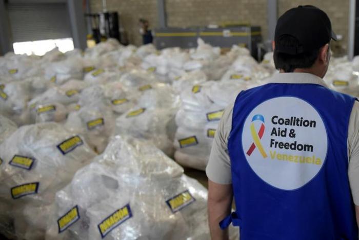 Humanitarian aid is seen in Cucuta, Colombia, on February 21, 2019 at the Tienditas International Bridge which has been blocked with containers by loyalists of Venezuelan President Maduro to prevent access to the country