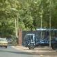 Riot police stand guard outside the University of Khartoum following an earlier demonstration