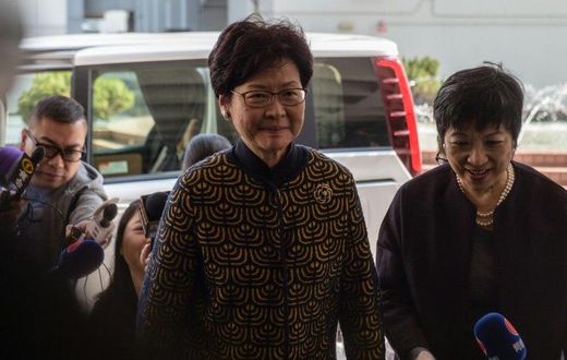 Hong Kong's former deputy leader Carrie Lam (C) arrives at the city's High Court to testify in the high-profile corruption trial of former Hong Kong chief executive Donald Tsang (not pictured) on January 26, 2017