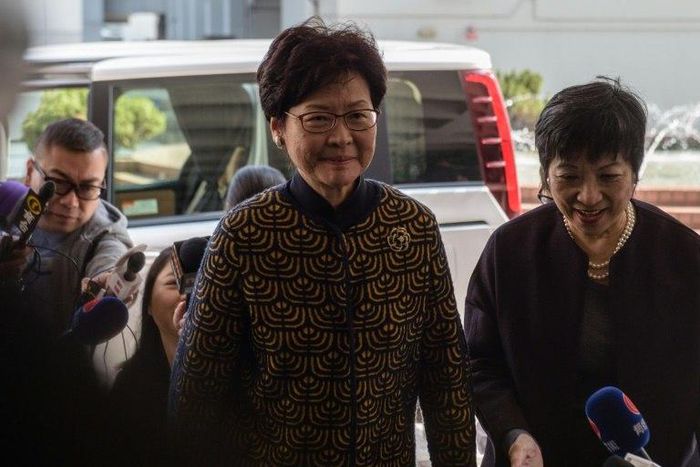 Hong Kong's former deputy leader Carrie Lam (C) arrives at the city's High Court to testify in the high-profile corruption trial of former Hong Kong chief executive Donald Tsang (not pictured) on January 26, 2017