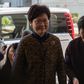 Hong Kong's former deputy leader Carrie Lam (C) arrives at the city's High Court to testify in the high-profile corruption trial of former Hong Kong chief executive Donald Tsang (not pictured) on January 26, 2017