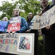 People protest outside the 9th US Circuit Court of Appeals in Seattle, Washington on May 15, 2017