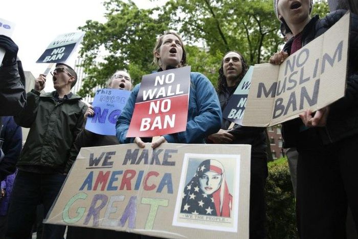 People protest outside the 9th US Circuit Court of Appeals in Seattle, Washington on May 15, 2017