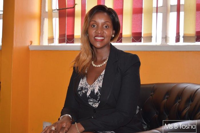 Miss B Tosha in her office