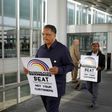 US civil rights activist the Reverend Jesse Jackson led a protest against United Airlines at O'Hare airport over the violent dragging of a paid passenger from his seat to accommodate the airline's overbooking of the flight
