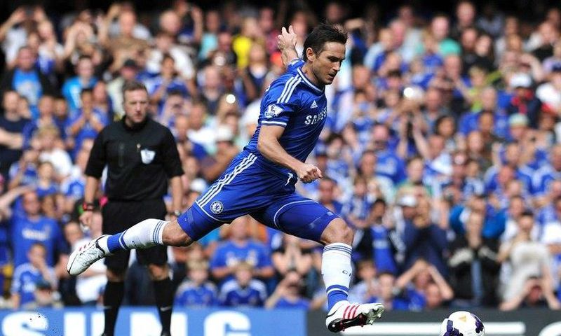 Frank Lampard, seen playing midfielder for Chelsea in 2013, called time on his glittering 21-year career on Thursday