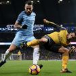 Manchester City's Nicolas Otamendi (left) wins the ball during their 2-1 victory over Arsenal at the Etihad Stadium in December 2016