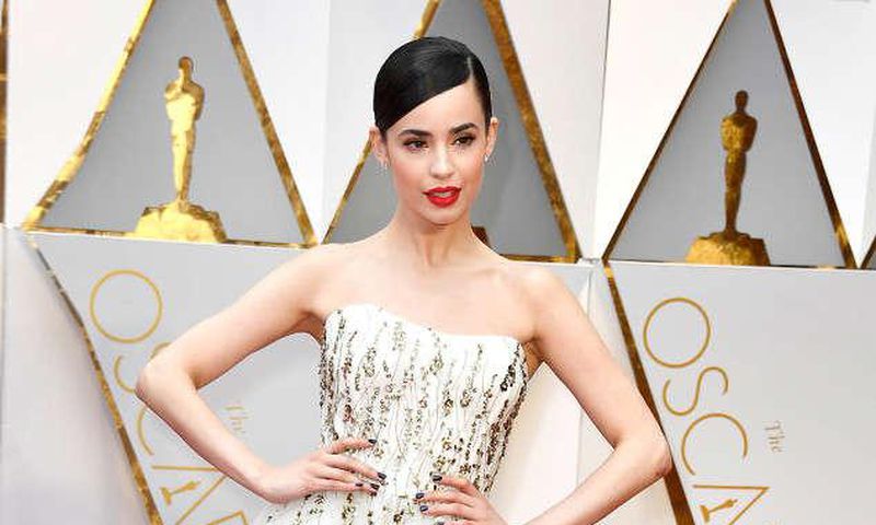 Sofia Carson's red carpet style at Oscars 2017